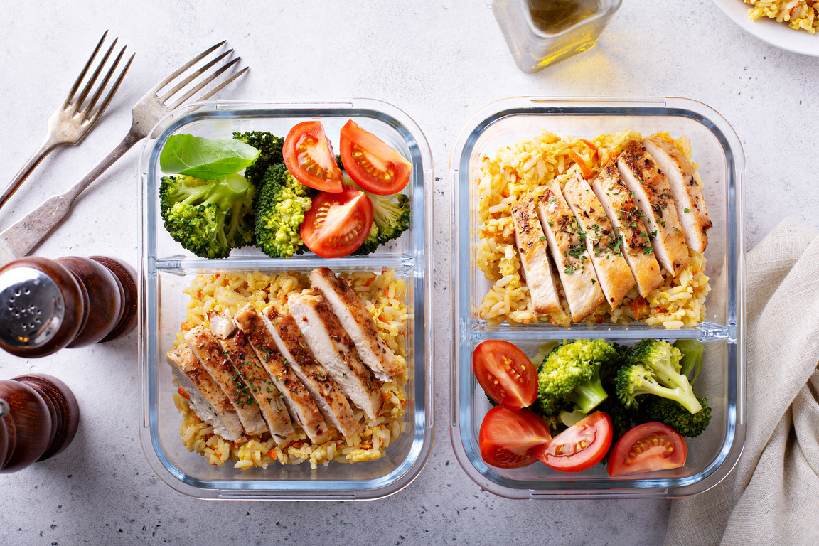 Healthy meal prep containers with chicken and rice